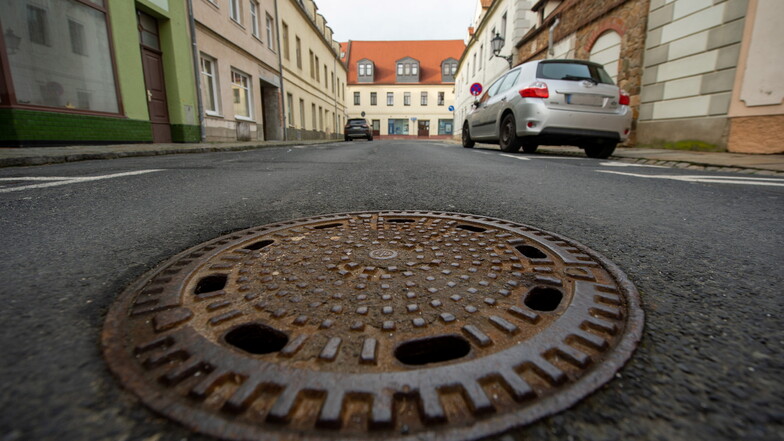 Warum sind Gullydeckel auf der Straße?