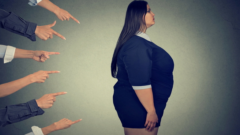 Doppelte Last: Übergewichtige Menschen erfahren oft Ablehnung.
