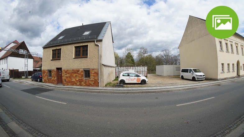 Ein Haus, kein Haus: In der Zittauer Straße in Herrnhut soll wieder ein geschlossener Häuserzug entstehen.