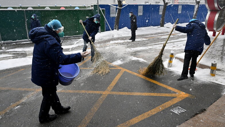 "Sie haben ja keine Schneeschaufeln": Winterdienst in China.