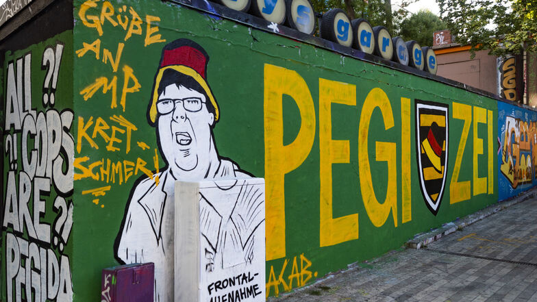 Der "Hutbürger" wurde an "Katys Garage" in der Dresdner Neustadt als Graffiti verewigt.