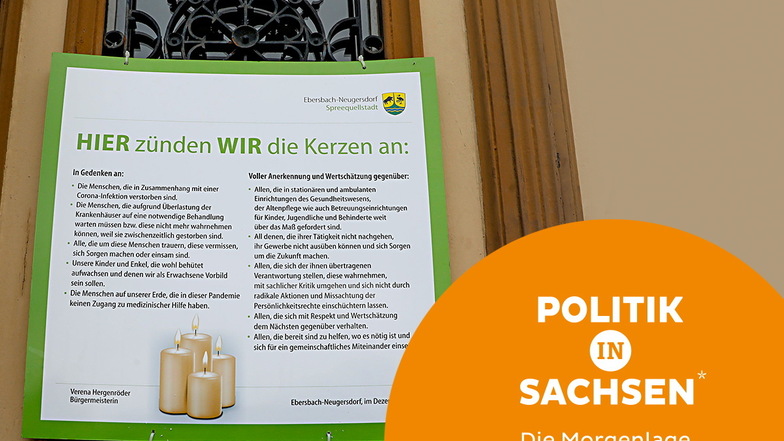 Eine Bürgermeisterin in Ostsachsen wirbt an der Rathaustür für Mitmenschlichkeit und Sachlichkeit in der Pandemie.