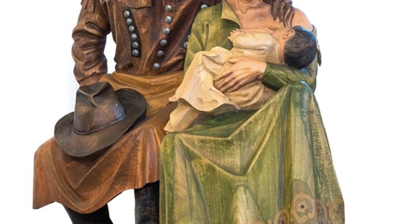 Krippenbilder: das Christuskind an der Brust der Mutter Maria mit Vater Joseph in Gestalt eines Bergzimmermannes ...