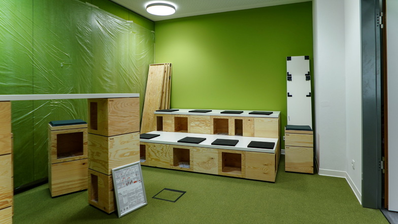 Grüne Wände, Möbel aus Holz, alles binnen Minute komplett umbaubar: Sie seht ein Kreativraum im Rathaus der Zukunft aus.