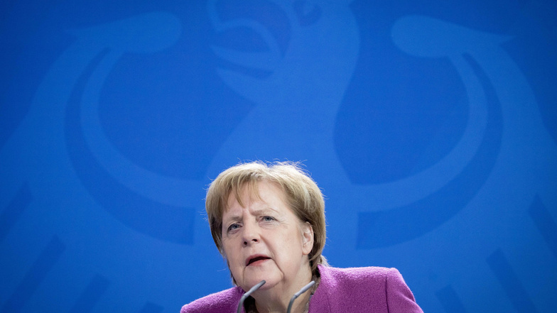 Angela Merkel kritisiert die US-Einstufung deutscher Pkws als Bedrohung für die nationale Sicherheit.