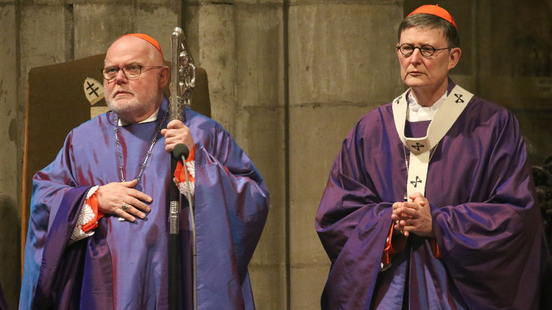 Kardinal Reinhard Marx und der Kölner Erzbischof Rainer Maria Woelki stehen wegen des Umgangs mit Missbrauchsfällen in der Kritik.