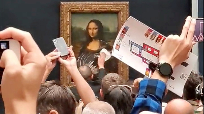 Verkleideter Mann wirft im Louvre Torte auf "Mona Lisa"