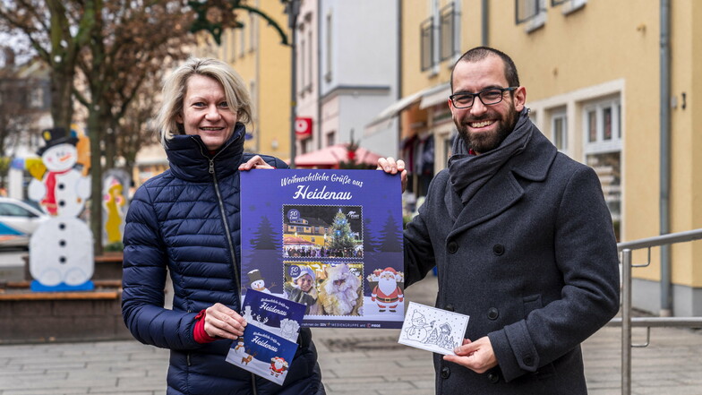 Vereinschefin und Apothekerin Claudia Benedikt und Postmodern-Marketingleiter Alexander Hesse präsentieren Heidenaus Weihnachtspost.