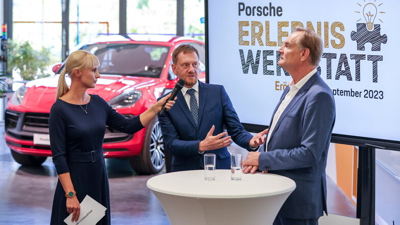 Kristin Bergemann von Porsche interviewt Sachsens MP Michael Kretschmer (CDU) und Burkhard Jung (SPD), Oberbürgermeister von Leipzig
