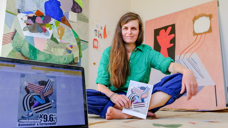 Henriette Grahnert mit ihrem Bild, das sie für die  Aktion #Machdeinkreuz schuf.