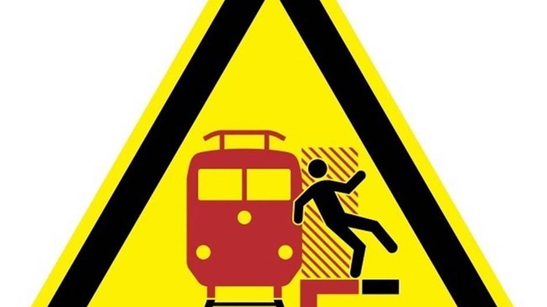 Überschreiten der Markierung Dieses Schild mahnt auf Bahnsteigen, auf die weiße Linie zu achten. Wer sie ignoriert, riskiert, vom Sog des Zuges mitgerissen zu werden.