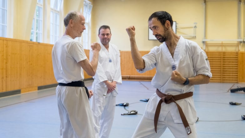 Johannes Schmidt (Mitte) und Dimitar Stoykow (re.) leiten den Kampfsportverein Görlitz.